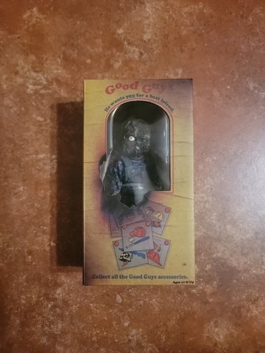 Charred chucky figure - chucky,